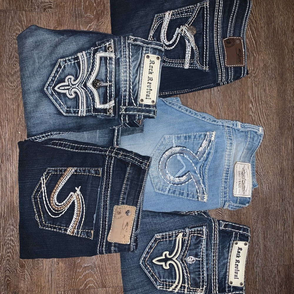 Lots of brand name Jeans sizes 25,26,27